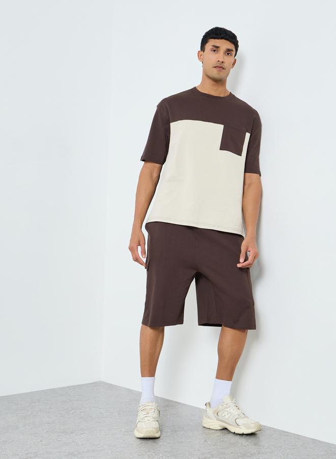 ستايلي طقم منسق من شورت وتيشيرت واسع بنمط كتل الالوان - Image 5